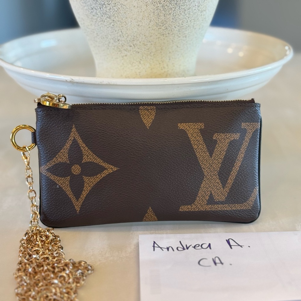 Louis Vuitton Brown Clutch with Gold Accents